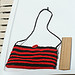 red and black striped purse